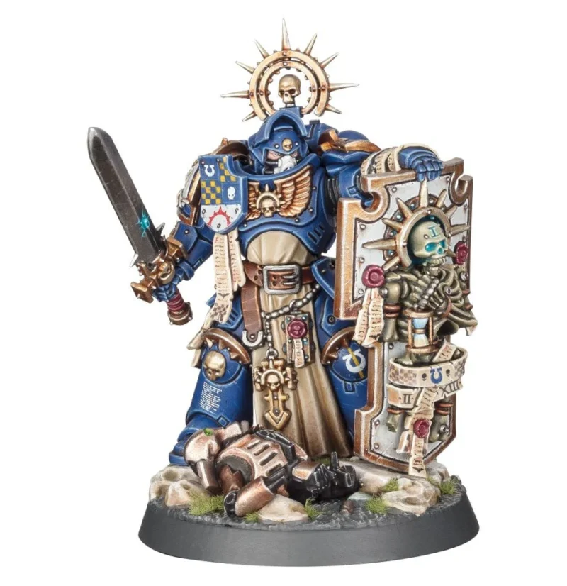 Majestic Space Marine in blue armor, wielding sword and shield on a rocky battlefield.