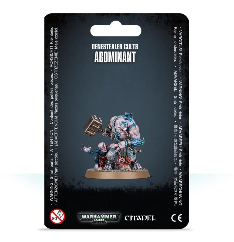 Intricate Genestealer Cults Abominant model in clear packaging on a dark background.