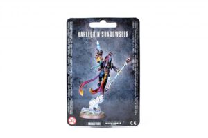 Vibrant Harlequin Shadowseer miniature showcases artistry and dynamic pose for tabletop gaming.