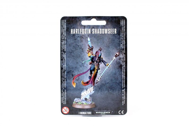 Vibrant Harlequin Shadowseer miniature showcases artistry and dynamic pose for tabletop gaming.