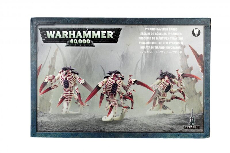 Warhammer 40,000 box art featuring dynamic miniatures in a dark, atmospheric battlefield.