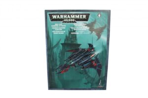 Warhammer 40,000 box art reveals an epic spacecraft amid a rich, immersive sci-fi landscape.