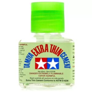 Tamiya Extra Thin Cement: essential adhesive for model builders with clear safety warnings.