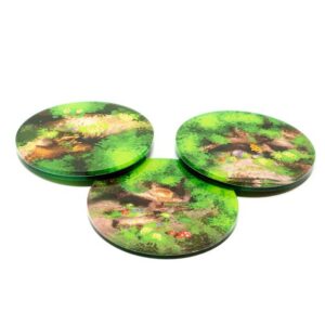 Vibrant forest coasters featuring unique nature designs, perfect for adding charm to your table.