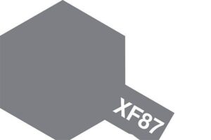 Minimalist gray hexagon with color code XF87 for design reference on a white background.