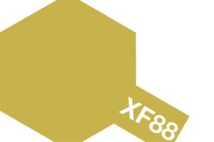 Muted warm yellow hexagonal swatch XF88 on a clean white background for creative use.