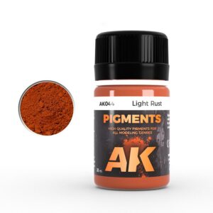 AK Light Rust pigment in an orange jar, perfect for diverse modeling and artistic projects.
