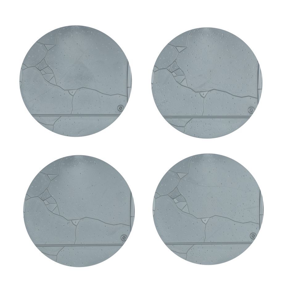 Stylish gray coasters with unique textures, perfect for modern and minimalist home decor.