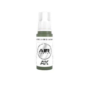 Sleek airbrush model paint bottle, white and green, for precision detailing in hobby projects.