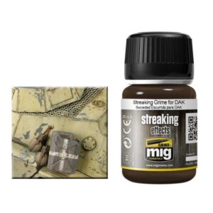 Model paint and a detailed DAK vehicle showcase realistic weathering effects for scale modeling.
