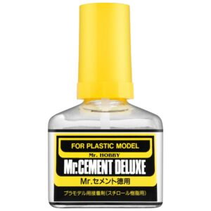 Mr. Cement Deluxe: Clear adhesive for precise plastic model building. Ideal for hobbyists.