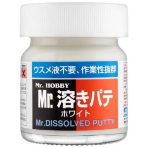 Mr. Hobbys White Dissolved Putty in a clear jar for seamless model finishing.