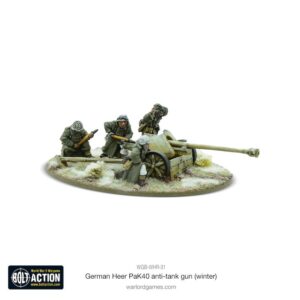 German Pak 40 anti-tank gun with soldiers in winter gear on snowy terrain.