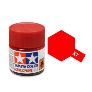Tamiya X7 vibrant red acrylic paint jar for model builders, featuring an iconic logo.