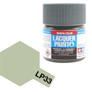 Tamiya LP33 soft green lacquer paint jar and color swatch for precise model detailing.
