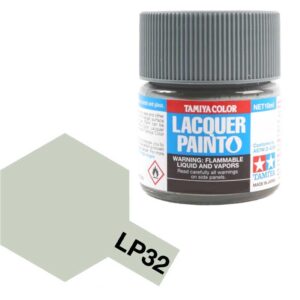 Tamiya LP32 lacquer paint jar and color swatch for model building projects.