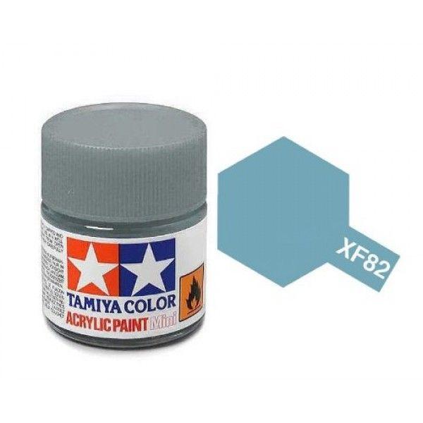 Tamiya XF-82 acrylic paint jar in soft blue-green for precise modeling applications.